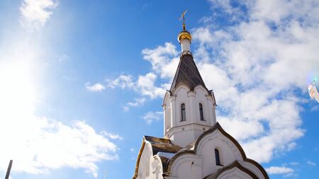 Orthodox white Church on blue sky background. Stock footage. Religious theme associated with...