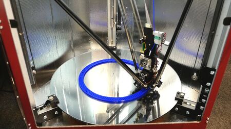 3d printing printer bright model close-up. Media. Automatic 3D printer performs plastic modeling in...