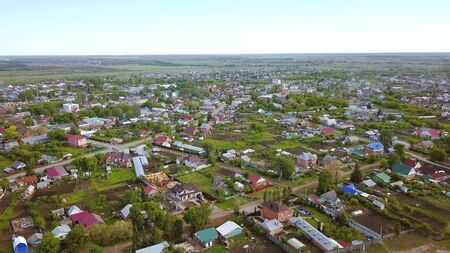 Top view on panorama of this village with cottages. Clip. Beautiful landscaped village for summer holiday in country with whole familyの写真素材