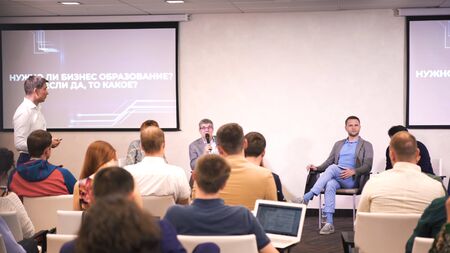 Russia - Moscow, 10.23.2019: Audience at the conference room listening to the business presentation, self development concept. Art. Listeners at the business forum.のeditorial素材