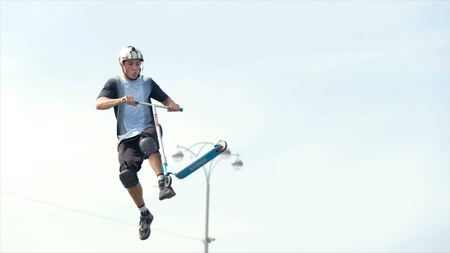 Yekaterinburg, Russia-August, 2019: Scooters perform stunts at sports festival. Action. World sports...