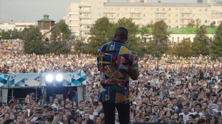 Ekaterinburg, Russia - August, 2019: View from the stage with singing on people fans. Action. Performance on stage on a holiday in the cityのeditorial素材