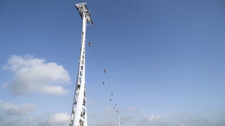 Bottom view of cable car on clear blue sky background, transportation concept. Stock footage....