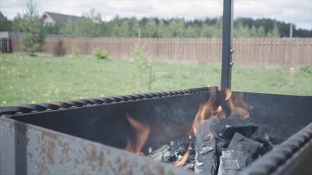 Close up of camp fire flames and fire, chargrillの写真素材