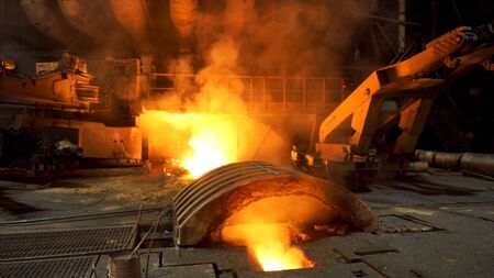 Close up view of working blast furnace at the metallurgical plant, heavy industry concept....