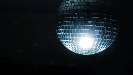 Disco ball with lights. Concept. Spinning disco ball in a dark roomの写真素材