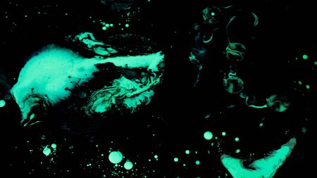 Abstract colorful paint reactions, psychedelic liquid light show, dye patterns in water, oil, paint. Marble background ink explosion, kaleidoscope or LSD effect.の写真素材