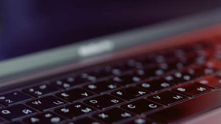 Close up of black keyboard and silver laptop, focus moving slowly. Action. New beautiful...