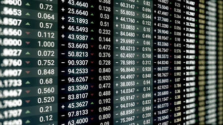 Stock market or stock exchange information with data of price, change, and volume. Animation. Financial indexes of stock companies change up and down over time market wall.の写真素材