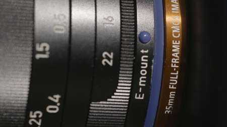 Close-up of photo lens details. Action. Macro photography of photo lens with detailed values on...