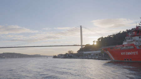 Turkey, Istanbul-December, 2020: Ship off coast of sea city. Action. Steamboat sails near shore of...