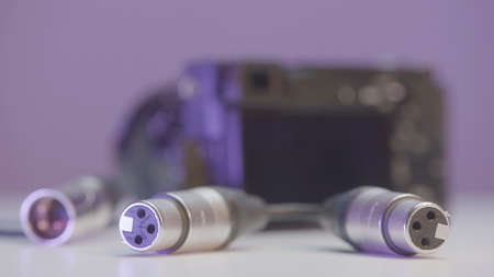 Close-up of microphone wires. Action. Cables with XLR connector for connecting microphones. Cables for connecting microphones to camera. Professional sound recordersの写真素材