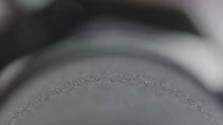 Close-up of modern microphone for sound recording. Action. Details of professional microphone model...