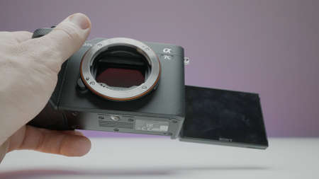Moscow, Russia - December, 2020: Close-up of new camera from Sony. Action. Photographer holds new...
