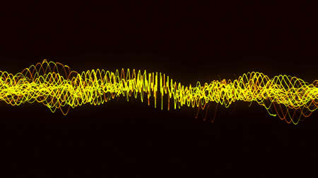 Moving multicolored swirling isolated lines on a black background, seamless loop. Animation. Abstract yellow twisted spirals.の写真素材