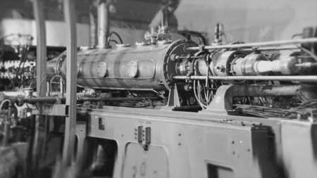 Russia - Irkutsk, 04.25.2021: retro USSR industrial background with engineers and workers at a...