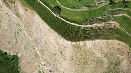 Aerial top view view of a mountain in the national park in Slovenia at spring. Action. Flying above...