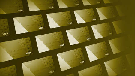 Credit card symbols floating in many rows. Motion. Golden beautiful design of modern credit cards, concept of online shopping.の写真素材