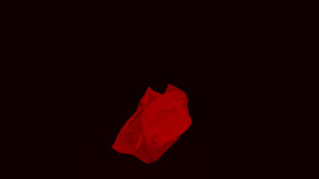 Floating red fabric on isolated background. Design. Folds on red fabric flying in air. Beautiful red fabric ghostly moves in airの写真素材