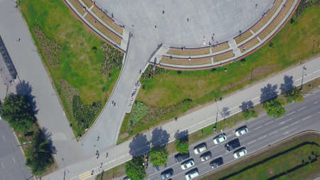 A birds-eye view photo. Clip. In the photo, a big city with a green park for people, with beautiful...
