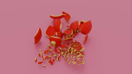 A red christmas tree toy ball falling down and breaking isolated on a pink background. Design. Breaking a ceramic toy ball.の写真素材