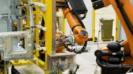 Japan - Tokyo, 12.10.2021: Robots assembling car parts at the Museum of Industry and Technology....