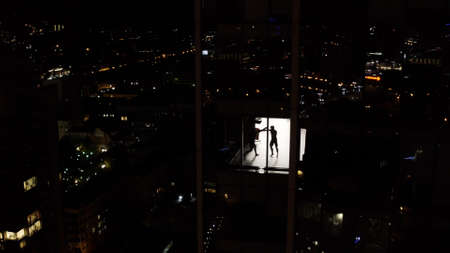 View from the height of a multi-storey building. Stock footage. Evening view from a height of how...