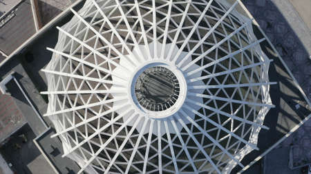 Modern white dome-shaped structure. Stock footage. Top view of beautiful domed structure in modern...