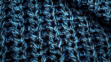 Wool texture, draped textile pattern closeup. Woolen texture fabric background. Visible details in delicate threads, that make up the woven fabricの写真素材