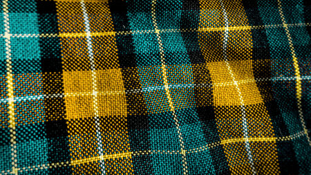 Caged fabric backgrond. Fabric as background. Terry cloth in a white blue cage