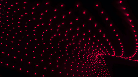 Curved 3d lines of dots move on black background. Design. Dots move in curved volumetric flow. Point flow with 3d effect and geometric curves in dark spaceの写真素材