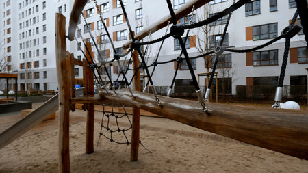 Wooden courtyard. Stock footage. Beautiful large house with a Playground in the yard.