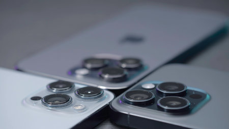 UK, London - September 15, 2023: Comparison of design of iPhone pro cameras. Action. Commercial for...