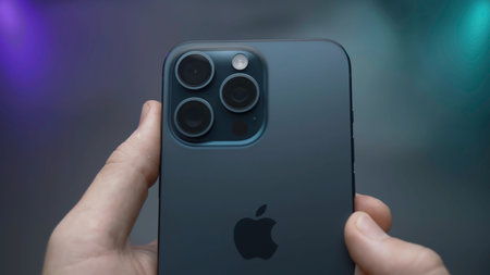UK, London - September 15, 2023: Close-up of new 15 iPhone pro. Action. Stylish design of latest...