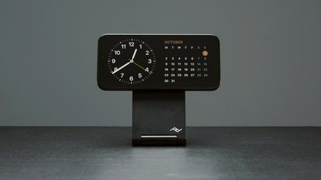 UK, London - September 15, 2023: Close-up of clock on iPhone 15 Pro. Action. Stylish design of touch...