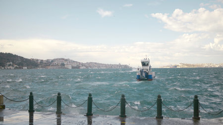 Raging sea. Action. View of the seascape,sailing ship and blue sky overhead.の写真素材