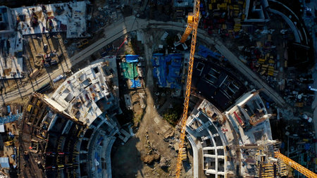 Process of building a stadium, aerial top view. Stock footage. Construction site, creation of metal structures during the construction of a stadium.の写真素材