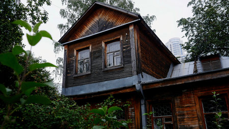 Exterior of a wooden house in the countryside. Stock footage. Traditional residential house with wooden walls.の写真素材