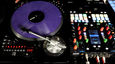 Berlin - Germany, december 6, 2022: Hands of soundman on the mixing console. Art. Working of sound designer.のeditorial素材