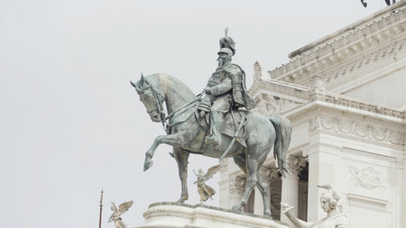Italy, Milan - August 30, 2022: Famous statues of Italy. Action. Beautiful monuments in squares of Italy. Cultural attractions and sculptures on streets of ancient historical city. Monument to Victor Emmanuel IIのeditorial素材