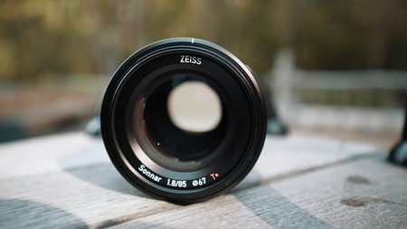 Germany, Berlin - August 15, 2022: Close-up camera lens. Action. Lens for professional camera on...