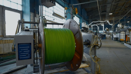 Modern cable manufacturing, cable factory. Creative. Electric cable production process in a modern factory.の写真素材