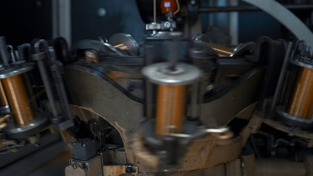Rotating coils with wire. Creative. Fast rotating coils with copper wire at metallurgical...