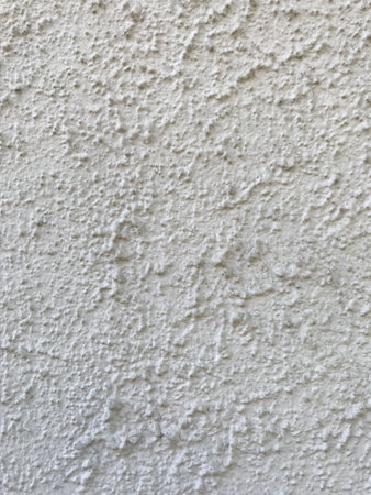 Texture of a wall covered with turqoise decorative brick-like tiles mosaic. Abstract background for design.の写真素材