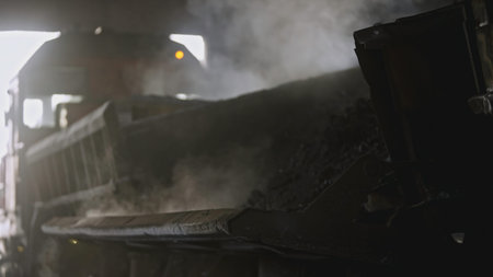 Wagon of hot ore at industrial plant. Stock footage. Industrial wagon at factory with hot steam of...