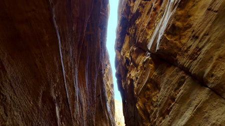 A Narrow Canyon Featuring Striking Light Effects and Textures That Captivate the Eye. Actionの写真素材