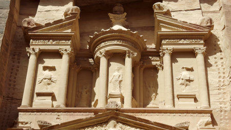 The Majestic Facade of Petra's Treasury is a breathtaking sight filled with history and culture.の写真素材