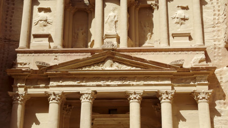 The Majestic Facade of Petras Treasury is a breathtaking sight filled with history and culture. Actionの写真素材