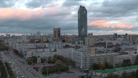 Top view of beautiful modern city in summer. Stock footage. Panorama of city with modern stylish architecture on horizon with cloudy skyの写真素材