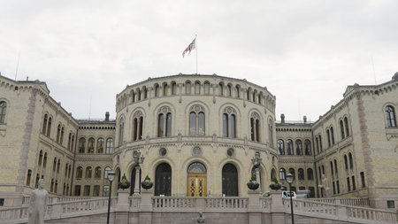 Buildings of the Parliament of Norway. Action.Old white stone building,Storting Monumentの写真素材